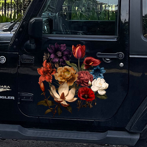A black Jeep Wrangler Sahara adorned with Cover-Alls' Dark Romance Vintage Flower Decals on the driver’s door, showcasing a variety of colorful flowers.