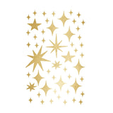 A collection of Cover-Alls Gold Twinkly Stars in various sizes and styles arranged in a magical scene on a white background.