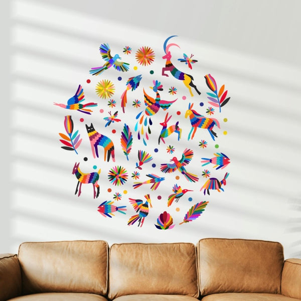 Colorful Cover-Alls Otomi Animals and Flowers Decals featuring abstract animals and floral designs above a brown leather sofa in a room with white Venetian blinds.