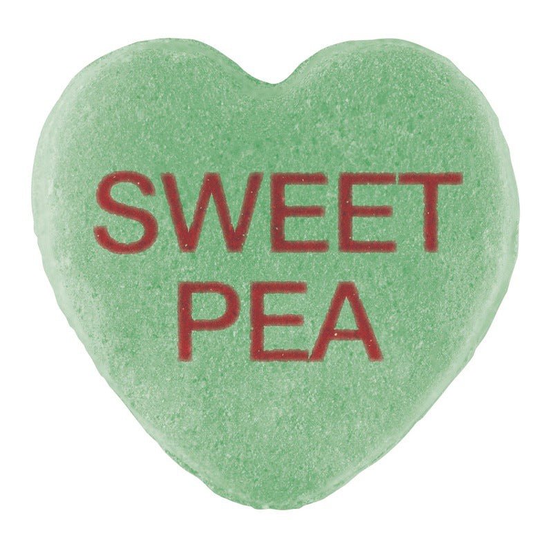 Green heart-shaped Candy Hearts with "sweet pea" text in red, featuring a Cover-Alls custom design.