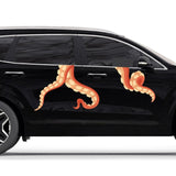 A black SUV with a large orange Eight Terrifying Tentacle Decals graphic, featuring prominent octopus tentacles, depicted on a plain white background by Cover-Alls.