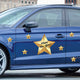 Gold Happy New Year's star with 10 small gold stars