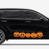 Side view of a black SUV with a row of Cover-Alls Jack O' Lantern Pumpkin Decals along the side, against a plain white background.
