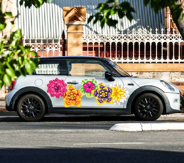 Crafting a Mobile Canvas: The Art of Making Your Car a Moving Masterpiece with Reusable Decals - Cover-Alls Decals