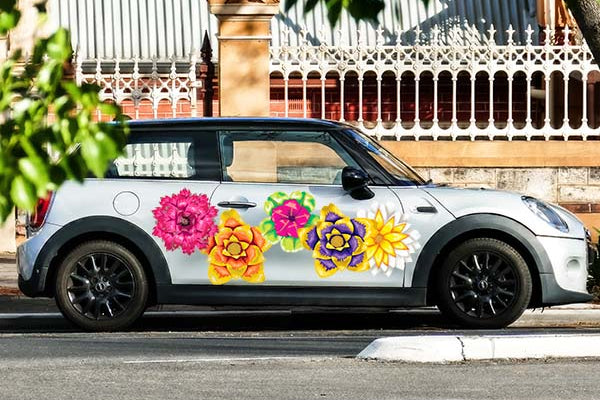 Crafting a Mobile Canvas: The Art of Making Your Car a Moving Masterpiece with Reusable Decals - Cover-Alls Decals