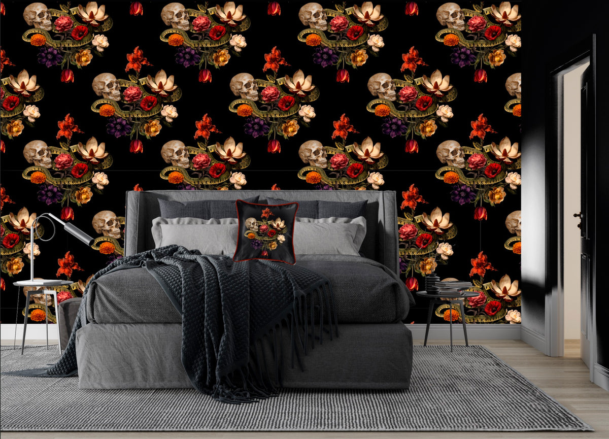 A bedroom features dark floral and skull patterned wallpaper, a gray bed with a dark blanket, and the Contrado Dark Romance Silk Pillow Cushion, giving the room a dramatic, gothic touch.