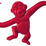 A red plastic toy monkey with outstretched arms, inspired by the classic game, perfect for decorating with Cover-Alls Decals' Barrel of Monkeys Decals.