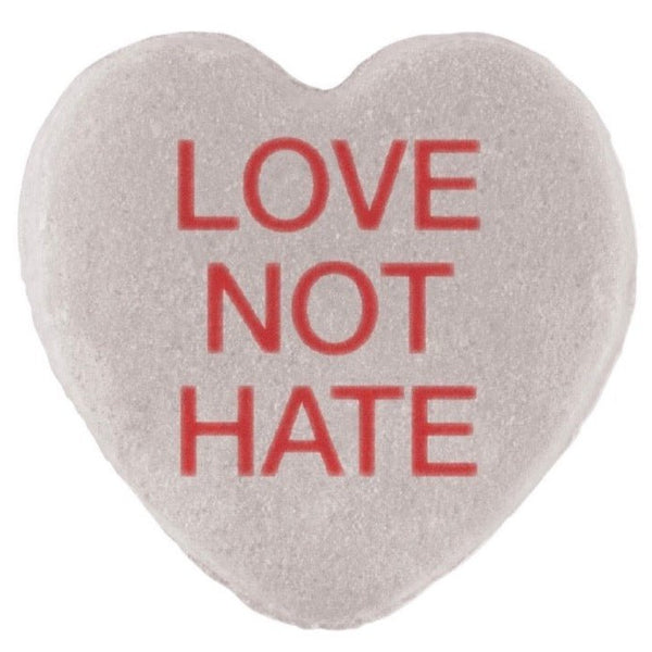 A Candy Hearts for Pride with the phrase "love not hate" printed in red letters, inspired by Pride Month, made by Cover-Alls.