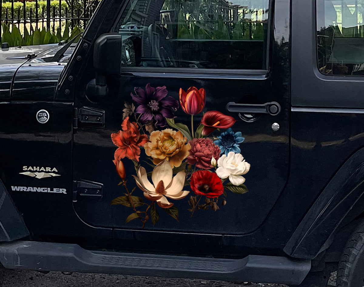 A black Jeep Wrangler Sahara adorned with Cover-Alls' Dark Romance Vintage Flower Decals on the driver’s door, showcasing a variety of colorful flowers.