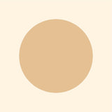 A simple graphic of a large, solid beige Cover-Alls Dot Decal centered on a light cream background.