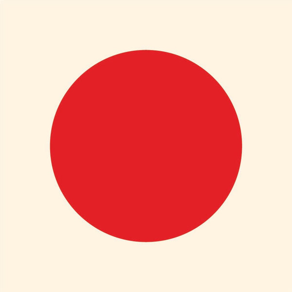 A large, solid red circle centered on a plain light beige background, resembling Cover-Alls Dot Decals.