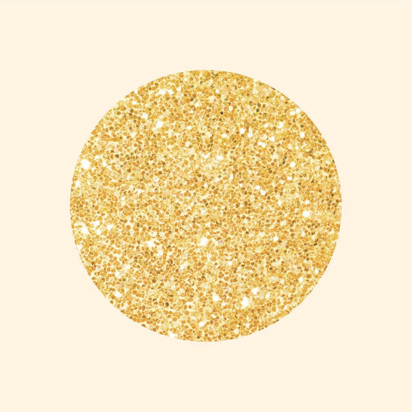 A Cover-Alls glittering golden circle with vibrant colors and a sparkling textured surface against a pale beige background.