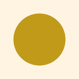 A simple graphic of a solid mustard yellow circle, centered on a light beige background with vibrant Cover-Alls Dot Decals.
