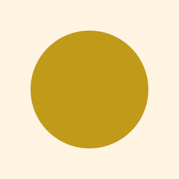A simple graphic of a solid mustard yellow circle, centered on a light beige background with vibrant Cover-Alls Dot Decals.