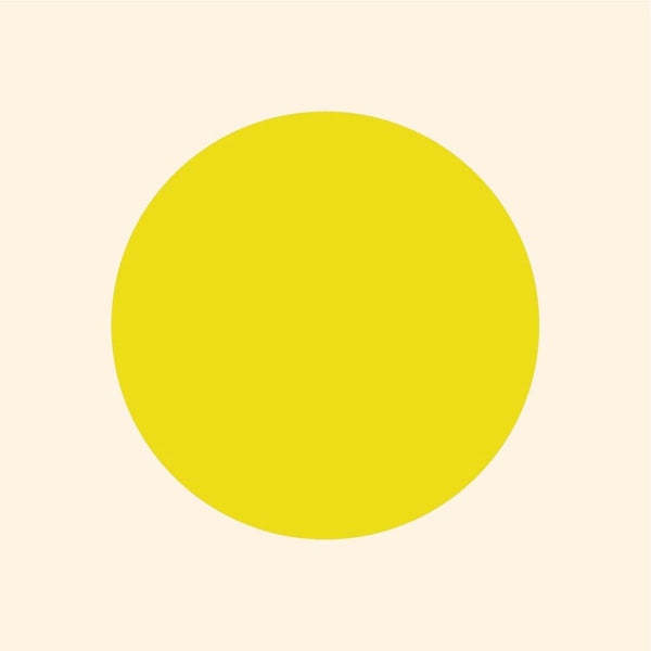 A large yellow circle centered on a plain light beige background with vibrant colors of Cover-Alls Dot Decals.