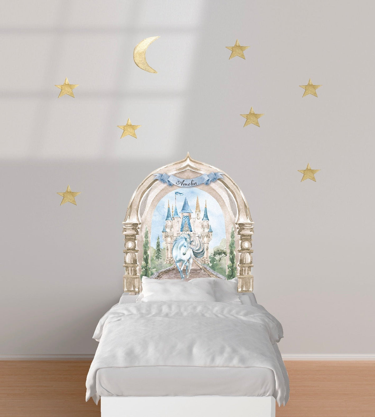 A child's bedroom with a Cover-Alls Enchanted Castle with Unicorn Decal above the bed depicting an enchanted castle, bordered by stars and a crescent moon.