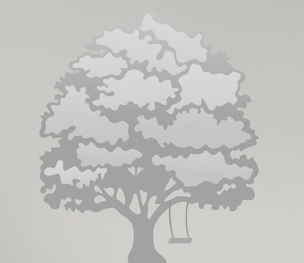 Silhouette of a Cover-Alls Family Tree Wall Decal with Custom Photos, with a swing hanging from one of its branches, depicted in a monochrome grey palette against a light grey background.