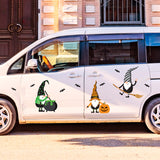 A white van is adorned with Cover-Alls' Halloween Gnomes decals, featuring garden gnomes in witch costumes, a pumpkin, a cauldron, and flying bats against a backdrop of a brick building.