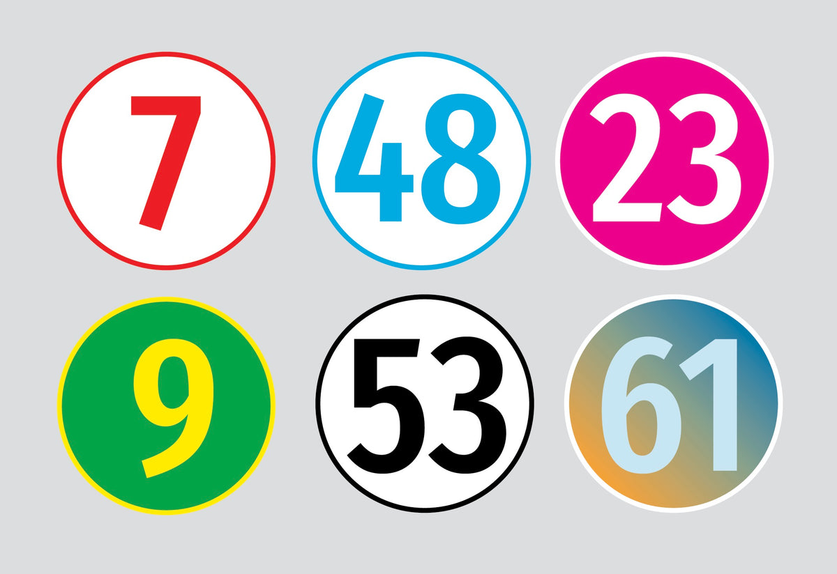Six colorful numbered circles on a gray background. Numbers are 7, 48, 23, 9, 53, and Cover-Alls Custom Race Car Numbers in red, blue, pink, green, black, and gradient colors respectively.