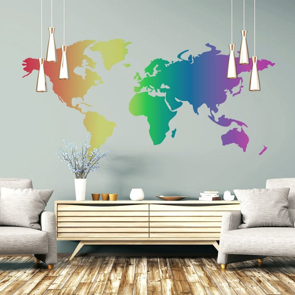 A modern living room with two gray armchairs, a wooden coffee table, and a Cover-Alls Rainbow World Map mural on the wall.