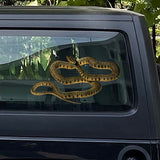 A Cover-Alls Striped Vintage Snake Decal is applied to the rear window of a dark-colored vehicle.