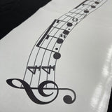 A Custom Musical Line Melody by Cover-Alls, featuring a G clef, two flat symbols, and musical notes in a 4/4 time signature, is elegantly displayed on a white piece of paper.