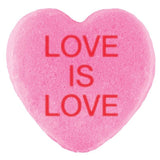 A pink heart-shaped Candy Hearts with the phrase 