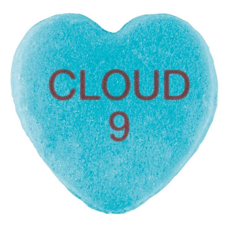 A blue, heart-shaped Candy Hearts with the words "cloud 9" embossed in red, perfect for Valentine's Day by Cover-Alls.