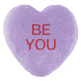 A purple heart-shaped Candy Hearts with the phrase 