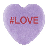 A purple heart-shaped Cover-Alls Candy Heart with the hashtag 