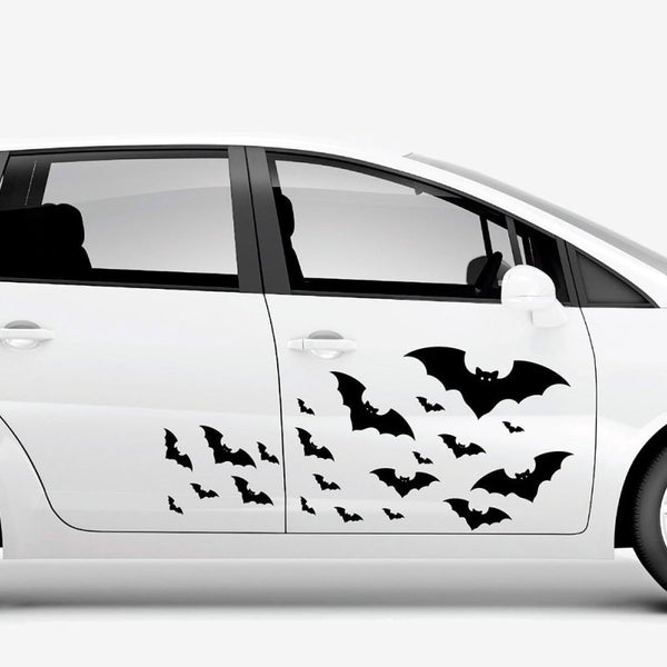 A white car with a Halloween themed Cauldron of Bats Decals from the CoverAlls brand on the side of it.