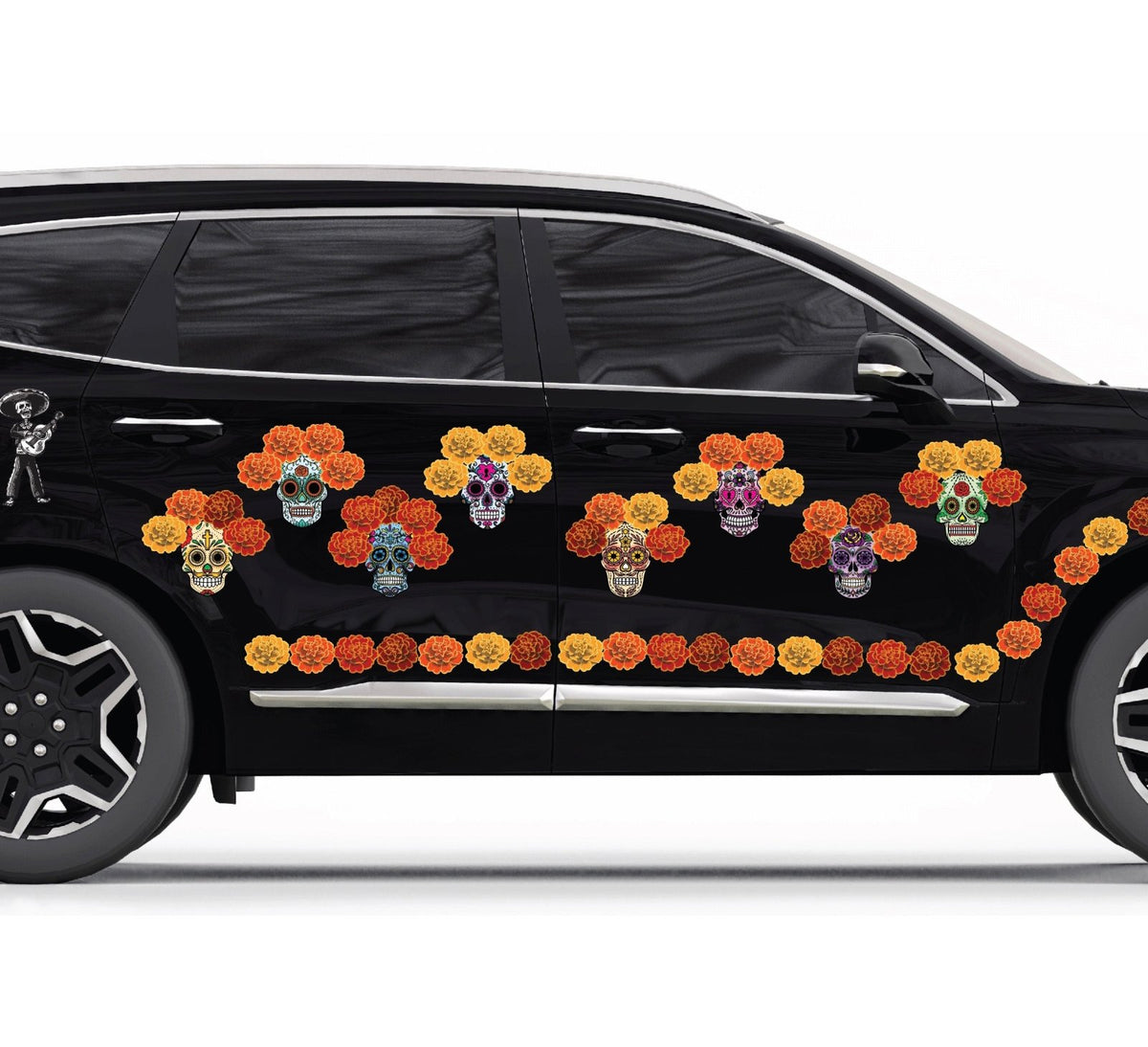 A black car decorated with colorful Day of the Dead Painted Skull Calaveras graphics and floral patterns on its side by Cover-Alls.