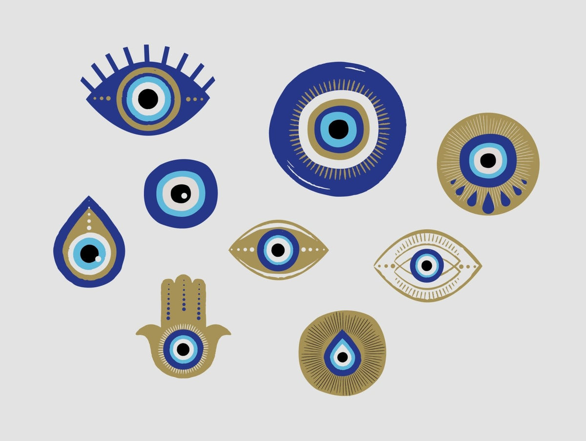 Graphic collection of various stylized eyes and symbols, including the protective emblem and hamsa, in blue, white, and gold tones by Cover-Alls Evil Eye Decals.