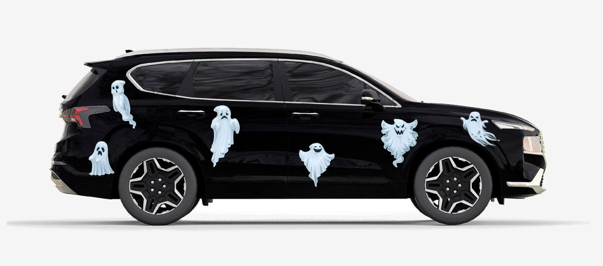 Black suv with seven Cover-Alls Ghost Decals of varying sizes adhered to the windows, depicted on a plain white background.