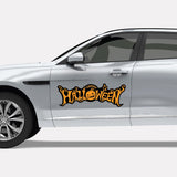 A silver CoverAlls jaguar f-type with a Halloween themed decal on it.