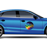 A blue sedan with a Jazzy Night Decal from Cover-Alls, featuring a graphic of colorful trumpets in a 70s style design on the doors, parked against a white background.