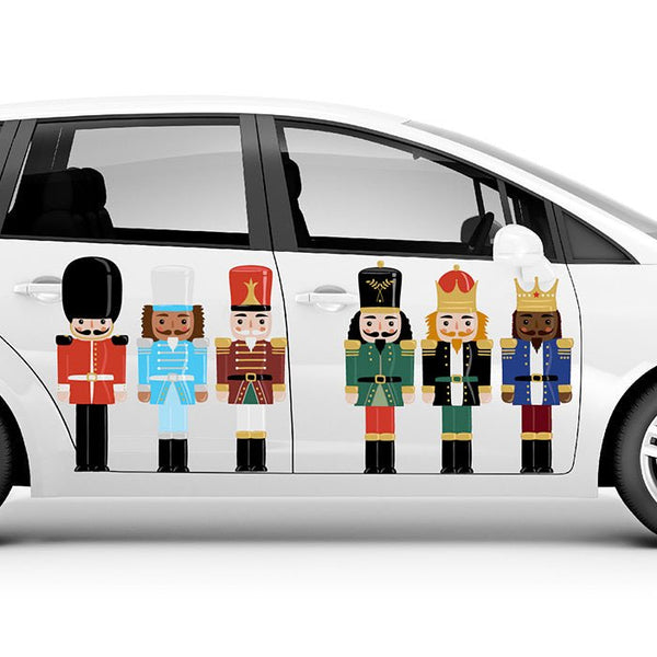 White minivan with a row of colorful Cover-Alls Nutcracker Decals illustrations on the side, isolated on a white background.