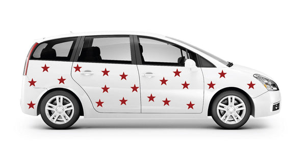 A white minivan decorated with multiple Red, White or Blue Star Decals on the side, shown in profile view against a plain white background by Cover-Alls.