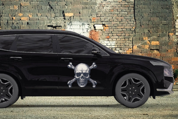 A black SUV with Halloween themed decals of Skull & Crossbones from the brand CoverAlls painted on it.