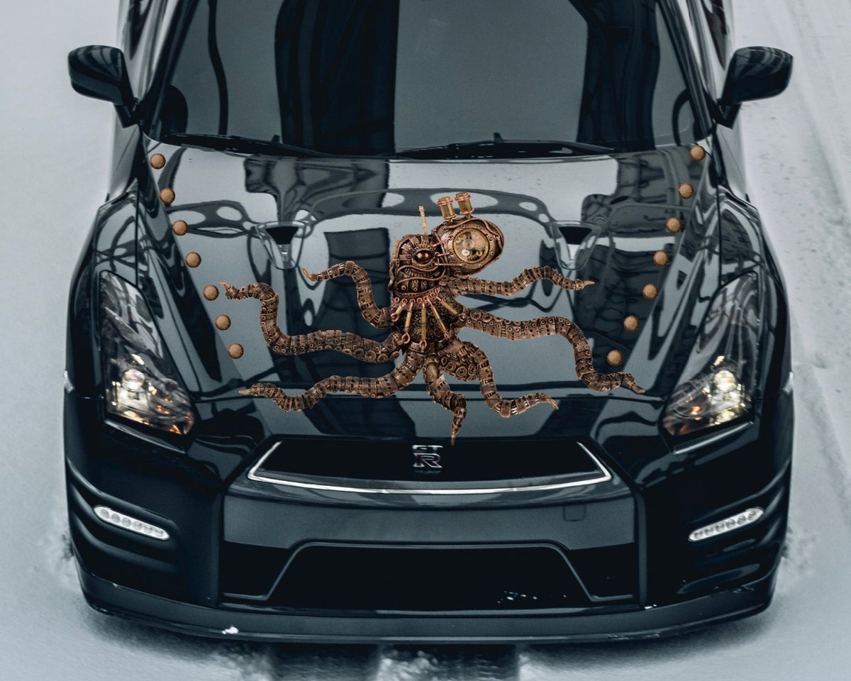 A black car with a Steampunk Octopus Decal by CoverAlls featuring a Halloween themed design on the hood.